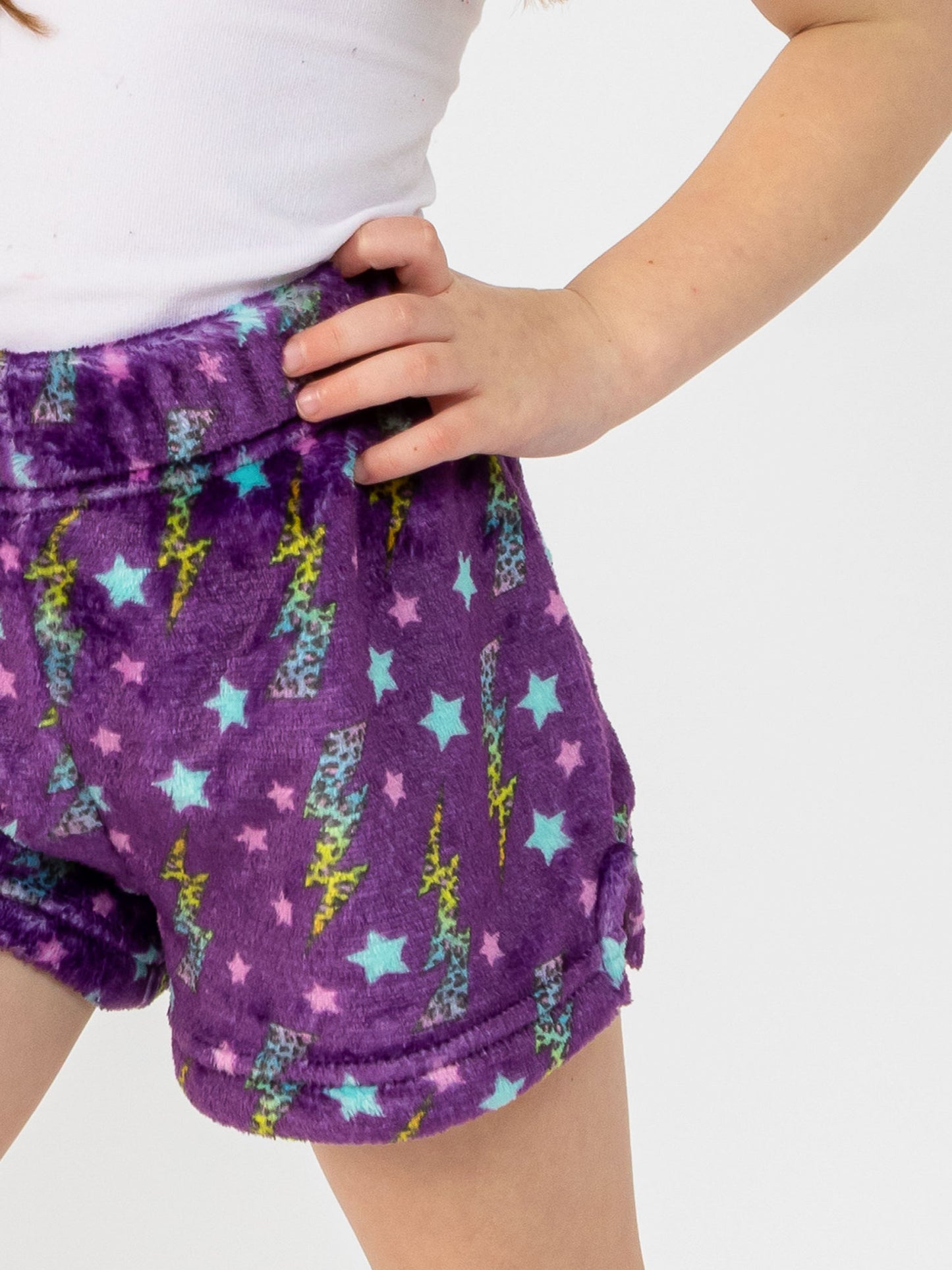 girls purple plush lounge shorts in lightning bolt print