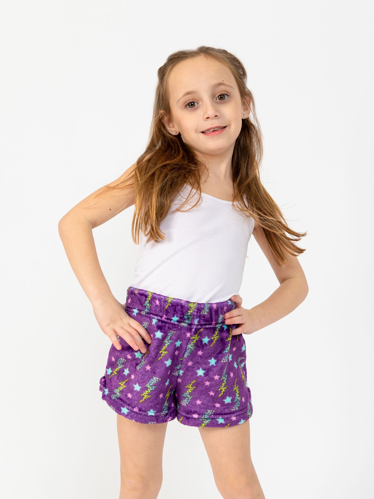 girls purple plush lounge shorts in lightning bolt print